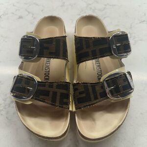 Birkenstock Brown Sandals with Silver Buckles